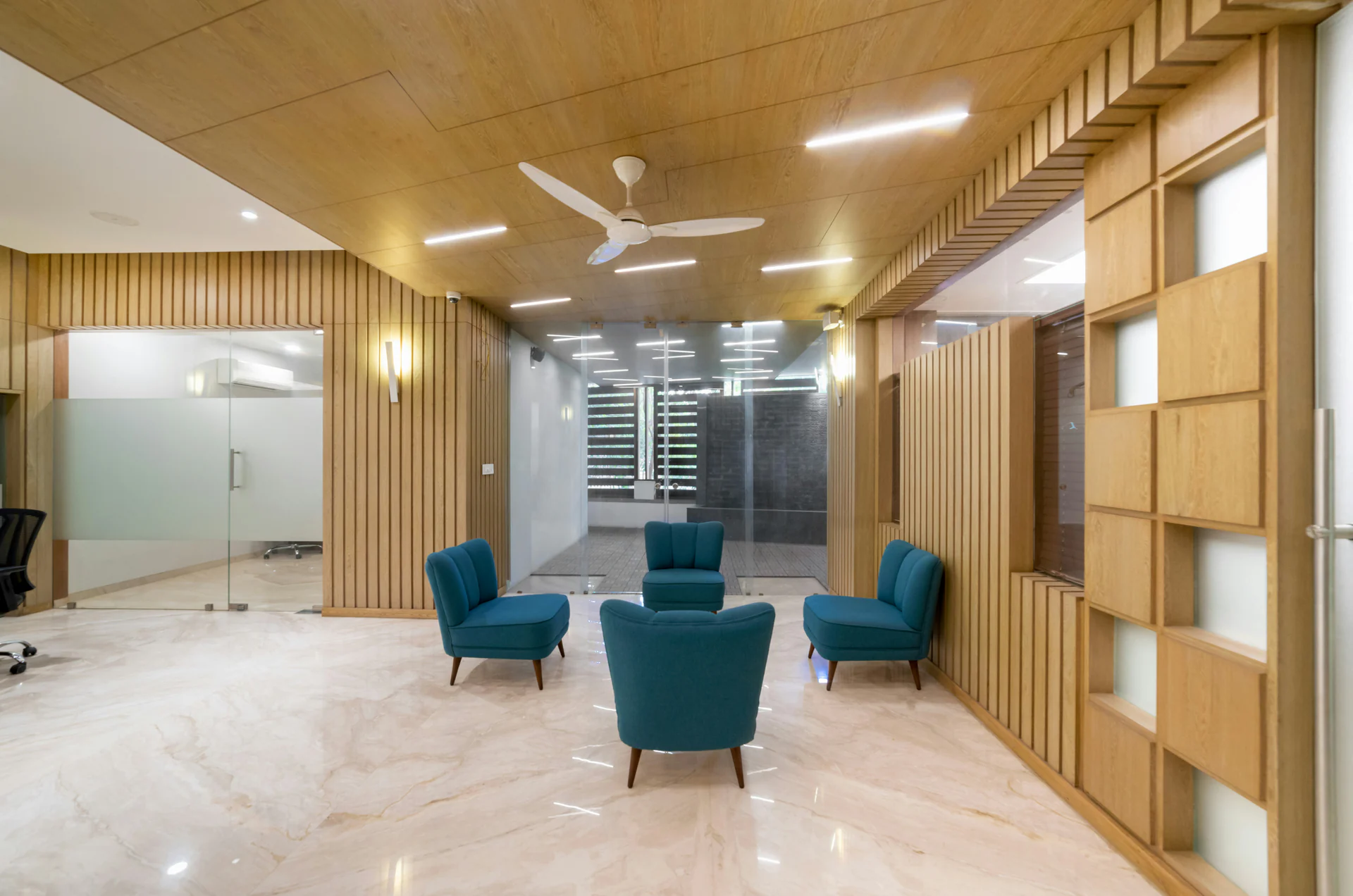 Timber office fit-out with wall and ceiling panelling — illustrative interior